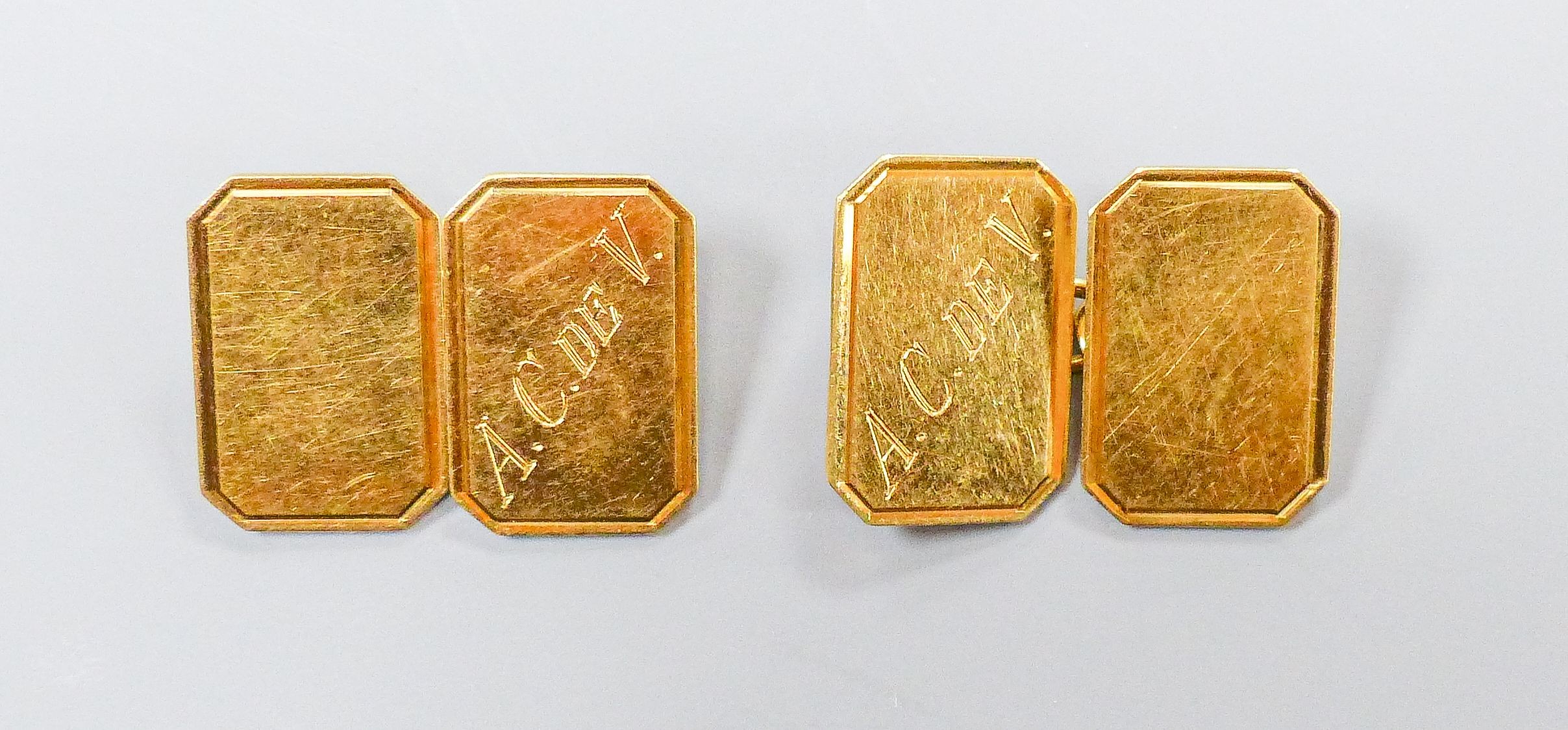A pair of modern 18ct yellow gold octagonal cufflinks with engraved initials, 8.6 grams.